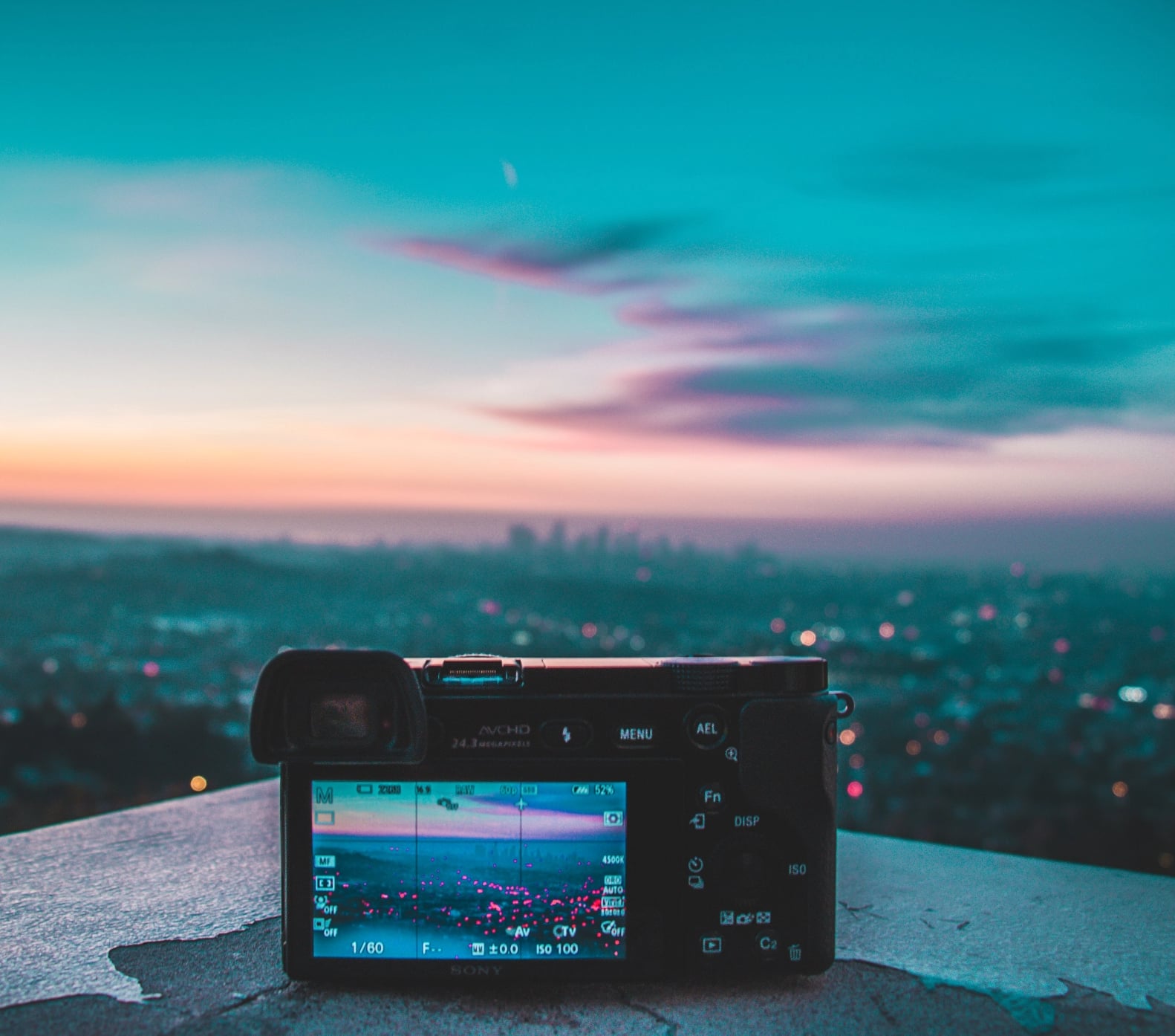 Social media content creation in Malaysia: camera filming at sunset